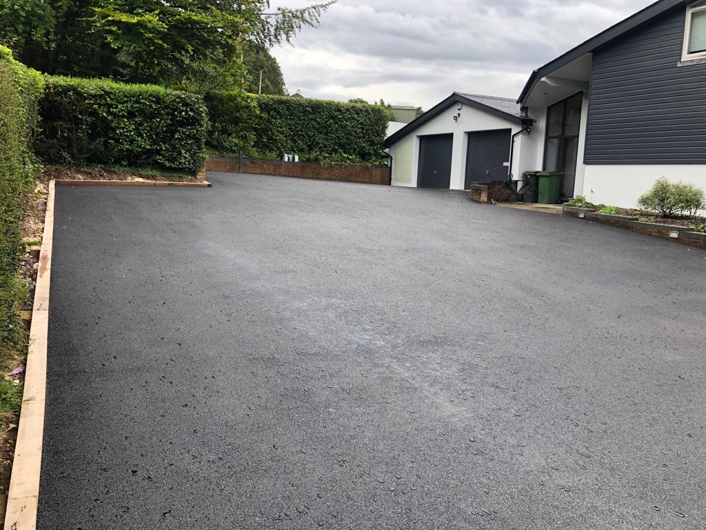This is a photo of a asphalt driveway which is in the process of being installed by Aratula Asphalt & Bitumen Surfacing